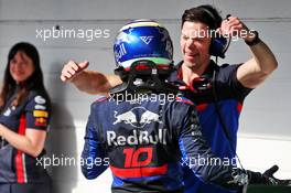 Pierre Gasly (FRA) Scuderia Toro Rosso celebrates his second position with Pyry Salmela (FIN) Scuderia Toro Rosso Personal Trainer in parc ferme. 17.11.2019. Formula 1 World Championship, Rd 20, Brazilian Grand Prix, Sao Paulo, Brazil, Race Day.