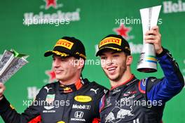 (L to R): Race winner Max Verstappen (NLD) Red Bull Racing with second placed Pierre Gasly (FRA) Scuderia Toro Rosso on the podium. 17.11.2019. Formula 1 World Championship, Rd 20, Brazilian Grand Prix, Sao Paulo, Brazil, Race Day.