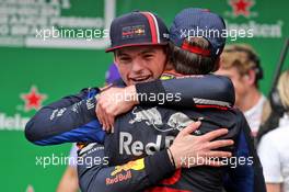 Race winner Max Verstappen (NLD) Red Bull Racing celebrates with second placed Pierre Gasly (FRA) Scuderia Toro Rosso in parc ferme. 17.11.2019. Formula 1 World Championship, Rd 20, Brazilian Grand Prix, Sao Paulo, Brazil, Race Day.