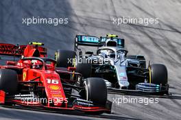 Charles Leclerc (MON) Ferrari SF90 and Valtteri Bottas (FIN) Mercedes AMG F1 W10. 17.11.2019. Formula 1 World Championship, Rd 20, Brazilian Grand Prix, Sao Paulo, Brazil, Race Day.
