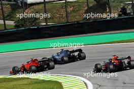 Charles Leclerc (MON) Ferrari SF90 and Lewis Hamilton (GBR) Mercedes AMG F1 W10 battle for position. 17.11.2019. Formula 1 World Championship, Rd 20, Brazilian Grand Prix, Sao Paulo, Brazil, Race Day.