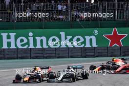 Lewis Hamilton (GBR) Mercedes AMG F1 W10 and Max Verstappen (NLD) Red Bull Racing RB15 battle for position. 17.11.2019. Formula 1 World Championship, Rd 20, Brazilian Grand Prix, Sao Paulo, Brazil, Race Day.