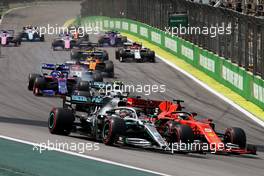 Lewis Hamilton (GBR), Mercedes AMG F1  and Sebastian Vettel (GER), Scuderia Ferrari  17.11.2019. Formula 1 World Championship, Rd 20, Brazilian Grand Prix, Sao Paulo, Brazil, Race Day.