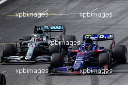 Pierre Gasly (FRA) Scuderia Toro Rosso STR14 and Lewis Hamilton (GBR) Mercedes AMG F1 W10. 17.11.2019. Formula 1 World Championship, Rd 20, Brazilian Grand Prix, Sao Paulo, Brazil, Race Day.