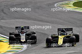 Kevin Magnussen (DEN) Haas VF-19 and Daniel Ricciardo (AUS) Renault F1 Team RS19 battle for position. 17.11.2019. Formula 1 World Championship, Rd 20, Brazilian Grand Prix, Sao Paulo, Brazil, Race Day.
