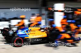 Carlos Sainz Jr (ESP) McLaren MCL34 makes a pit stop. 17.11.2019. Formula 1 World Championship, Rd 20, Brazilian Grand Prix, Sao Paulo, Brazil, Race Day.
