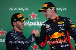 (L to R): Pierre Gasly (FRA) Scuderia Toro Rosso celebrates his second position on the podium with race winner Max Verstappen (NLD) Red Bull Racing. 17.11.2019. Formula 1 World Championship, Rd 20, Brazilian Grand Prix, Sao Paulo, Brazil, Race Day.