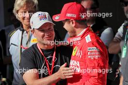 (L to R): Rubens Barrichello (BRA) with Sebastian Vettel (GER) Ferrari. 16.11.2019. Formula 1 World Championship, Rd 20, Brazilian Grand Prix, Sao Paulo, Brazil, Qualifying Day.