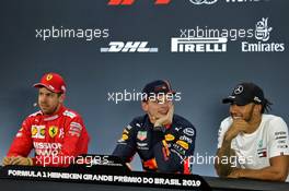 (L to R): Sebastian Vettel (GER) Ferrari; Max Verstappen (NLD) Red Bull Racing; and Lewis Hamilton (GBR) Mercedes AMG F1, in the post qualifying FIA Press Conference. 16.11.2019. Formula 1 World Championship, Rd 20, Brazilian Grand Prix, Sao Paulo, Brazil, Qualifying Day.