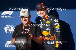 Max Verstappen (NLD) Red Bull Racing celebrates the Pirelli Pole Position Award with Rubens Barrichello (BRA) in parc ferme. 16.11.2019. Formula 1 World Championship, Rd 20, Brazilian Grand Prix, Sao Paulo, Brazil, Qualifying Day.