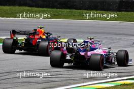 Alexander Albon (THA) Red Bull Racing RB15 and Lance Stroll (CDN) Racing Point F1 Team RP19. 16.11.2019. Formula 1 World Championship, Rd 20, Brazilian Grand Prix, Sao Paulo, Brazil, Qualifying Day.