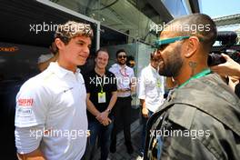 (L to R): Lando Norris (GBR) McLaren with Daniel Alves (BRA) Football Player. 17.11.2019. Formula 1 World Championship, Rd 20, Brazilian Grand Prix, Sao Paulo, Brazil, Race Day.