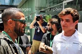 Lando Norris (GBR) McLaren with Daniel Alves (BRA) Football Player. 17.11.2019. Formula 1 World Championship, Rd 20, Brazilian Grand Prix, Sao Paulo, Brazil, Race Day.
