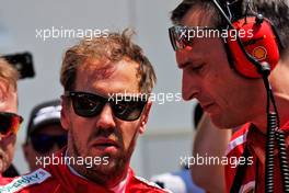 Sebastian Vettel (GER) Ferrari with Riccardo Adami (ITA) Ferrari Race Engineer on the grid. 09.06.2019. Formula 1 World Championship, Rd 7, Canadian Grand Prix, Montreal, Canada, Race Day.