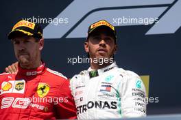 (L to R): second placed Sebastian Vettel (GER) Ferrari on the podium with race winner Lewis Hamilton (GBR) Mercedes AMG F1. 09.06.2019. Formula 1 World Championship, Rd 7, Canadian Grand Prix, Montreal, Canada, Race Day.