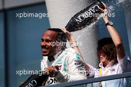 Race winner Lewis Hamilton (GBR) Mercedes AMG F1 celebrates on the podium with Marga Torres Diez, Mercedes AMG F1 Power Unit Engineer. 09.06.2019. Formula 1 World Championship, Rd 7, Canadian Grand Prix, Montreal, Canada, Race Day.