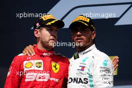 (L to R): second placed Sebastian Vettel (GER) Ferrari on the podium with race winner Lewis Hamilton (GBR) Mercedes AMG F1. 09.06.2019. Formula 1 World Championship, Rd 7, Canadian Grand Prix, Montreal, Canada, Race Day.