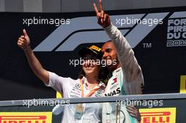 Race winner Lewis Hamilton (GBR) Mercedes AMG F1 celebrates on the podium with Marga Torres Diez, Mercedes AMG F1 Power Unit Engineer. 09.06.2019. Formula 1 World Championship, Rd 7, Canadian Grand Prix, Montreal, Canada, Race Day.