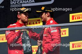 (L to R): second placed Sebastian Vettel (GER) Ferrari with third placed team mate Charles Leclerc (MON) Ferrari on the podium. 09.06.2019. Formula 1 World Championship, Rd 7, Canadian Grand Prix, Montreal, Canada, Race Day.