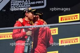 (L to R): second placed Sebastian Vettel (GER) Ferrari with third placed team mate Charles Leclerc (MON) Ferrari on the podium. 09.06.2019. Formula 1 World Championship, Rd 7, Canadian Grand Prix, Montreal, Canada, Race Day.