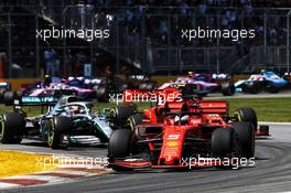 Sebastian Vettel (GER) Ferrari SF90 leads at the start of the race. 09.06.2019. Formula 1 World Championship, Rd 7, Canadian Grand Prix, Montreal, Canada, Race Day.