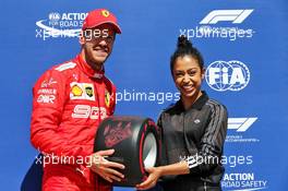 Sebastian Vettel (GER) Ferrari receives the Pirelli pole position award from Liza Koshy (USA) Actress and TV Presenter. 08.06.2019. Formula 1 World Championship, Rd 7, Canadian Grand Prix, Montreal, Canada, Qualifying Day.