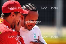 (L to R): Pole sitter Sebastian Vettel (GER) Ferrari with third placed Lewis Hamilton (GBR) Mercedes AMG F1 in qualifying parc ferme. 08.06.2019. Formula 1 World Championship, Rd 7, Canadian Grand Prix, Montreal, Canada, Qualifying Day.