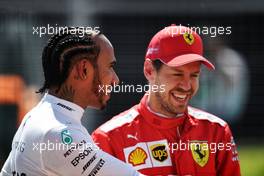 (L to R): Third placed Lewis Hamilton (GBR) Mercedes AMG F1 with pole sitter Sebastian Vettel (GER) Ferrari in qualifying parc ferme. 08.06.2019. Formula 1 World Championship, Rd 7, Canadian Grand Prix, Montreal, Canada, Qualifying Day.
