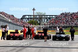 Qualifying parc ferme (L to R): Charles Leclerc (MON) Ferrari SF90, third; Sebastian Vettel (GER) Ferrari SF90, pole position; Lewis Hamilton (GBR) Mercedes AMG F1 W10, second. 08.06.2019. Formula 1 World Championship, Rd 7, Canadian Grand Prix, Montreal, Canada, Qualifying Day.