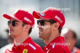 Sebastian Vettel (GER) Ferrari with Charles Leclerc (MON) Ferrari. 06.06.2019. Formula 1 World Championship, Rd 7, Canadian Grand Prix, Montreal, Canada, Preparation Day.