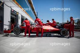 The Ferrari SF90 of Charles Leclerc (MON) is pushed down the pit lane by mechanics. 06.06.2019. Formula 1 World Championship, Rd 7, Canadian Grand Prix, Montreal, Canada, Preparation Day.