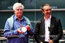 (L to R): Roger Benoit, Journalist with Marin Aleksov, Rosland Capital CEO - official 1000th Grand Prix coin presentation for the most Grand Prix attended. 12.04.2019. Formula 1 World Championship, Rd 3, Chinese Grand Prix, Shanghai, China, Practice Day.