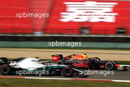 Pierre Gasly (FRA) Red Bull Racing RB15 passes Valtteri Bottas (FIN) Mercedes AMG F1 W10. 12.04.2019. Formula 1 World Championship, Rd 3, Chinese Grand Prix, Shanghai, China, Practice Day.