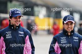 (L to R): Lance Stroll (CDN) Racing Point F1 Team with Sergio Perez (MEX) Racing Point F1 Team. 12.04.2019. Formula 1 World Championship, Rd 3, Chinese Grand Prix, Shanghai, China, Practice Day.
