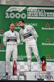 (L to R): Valtteri Bottas (FIN) Mercedes AMG F1 on the podium with team mate and race winner Lewis Hamilton (GBR) Mercedes AMG F1. 14.04.2019. Formula 1 World Championship, Rd 3, Chinese Grand Prix, Shanghai, China, Race Day.