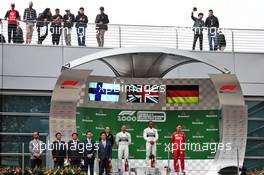 The podium (L to R): Valtteri Bottas (FIN) Mercedes AMG F1, second; Lewis Hamilton (GBR) Mercedes AMG F1, race winner; Sebastian Vettel (GER) Ferrari, third. 14.04.2019. Formula 1 World Championship, Rd 3, Chinese Grand Prix, Shanghai, China, Race Day.