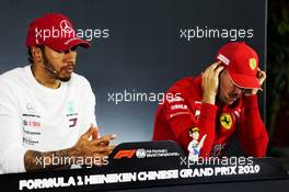 (L to R): race winner Lewis Hamilton (GBR) Mercedes AMG F1 and Sebastian Vettel (GER) Ferrari in the FIA Press Conference. 14.04.2019. Formula 1 World Championship, Rd 3, Chinese Grand Prix, Shanghai, China, Race Day.
