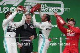 1st place Lewis Hamilton (GBR) Mercedes AMG F1 W10 with 2nd place Valtteri Bottas (FIN) Mercedes AMG F1 W10 and 3rd place Sebastian Vettel (GER) Ferrari SF90. 14.04.2019. Formula 1 World Championship, Rd 3, Chinese Grand Prix, Shanghai, China, Race Day.