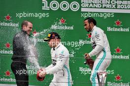 Valtteri Bottas (FIN) Mercedes AMG F1 celebrates his second position on the podium with race winner Lewis Hamilton (GBR) Mercedes AMG F1 and Marcus Dudley (GBR) Mercedes AMG F1 Performance Engineer. 14.04.2019. Formula 1 World Championship, Rd 3, Chinese Grand Prix, Shanghai, China, Race Day.