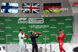 (L to R): Valtteri Bottas (FIN) Mercedes AMG F1 celebrates on the podium with Marcus Dudley (GBR) Mercedes AMG F1 Performance Engineer and Sebastian Vettel (GER) Ferrari. 14.04.2019. Formula 1 World Championship, Rd 3, Chinese Grand Prix, Shanghai, China, Race Day.
