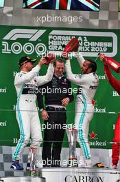 The podium (L to R): Valtteri Bottas (FIN) Mercedes AMG F1, second; Marcus Dudley (GBR) Mercedes AMG F1 Performance Engineer; Lewis Hamilton (GBR) Mercedes AMG F1, race winner. 14.04.2019. Formula 1 World Championship, Rd 3, Chinese Grand Prix, Shanghai, China, Race Day.