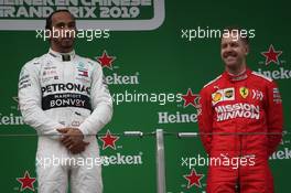 1st place Lewis Hamilton (GBR) Mercedes AMG F1 W10 and 3rd place Sebastian Vettel (GER) Ferrari SF90. 14.04.2019. Formula 1 World Championship, Rd 3, Chinese Grand Prix, Shanghai, China, Race Day.