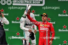 Sebastian Vettel (GER) Ferrari celebrates his third position on the podium. 14.04.2019. Formula 1 World Championship, Rd 3, Chinese Grand Prix, Shanghai, China, Race Day.