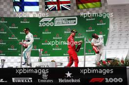 (L to R): Valtteri Bottas (FIN) Mercedes AMG F1 celebrates on the podium with Sebastian Vettel (GER) Ferrari and race winner Lewis Hamilton (GBR) Mercedes AMG F1. 14.04.2019. Formula 1 World Championship, Rd 3, Chinese Grand Prix, Shanghai, China, Race Day.