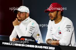 (L to R): Valtteri Bottas (FIN) Mercedes AMG F1 and race winner Lewis Hamilton (GBR) Mercedes AMG F1 in the FIA Press Conference. 14.04.2019. Formula 1 World Championship, Rd 3, Chinese Grand Prix, Shanghai, China, Race Day.