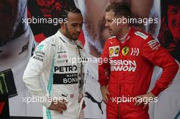 Lewis Hamilton (GBR) Mercedes AMG F1 W10 and Sebastian Vettel (GER) Ferrari SF90. 14.04.2019. Formula 1 World Championship, Rd 3, Chinese Grand Prix, Shanghai, China, Race Day.