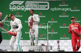 1st place Lewis Hamilton (GBR) Mercedes AMG F1 W10 2nd place Valtteri Bottas (FIN) Mercedes AMG F1 and Sebastian Vettel (GER) Ferrari SF90. 14.04.2019. Formula 1 World Championship 14.04.2019. Formula 1 World Championship, Rd 3, Chinese Grand Prix, Shanghai, China, Race Day.