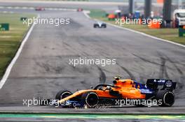 Lando Norris (GBR) McLaren MCL34 sends sparks flying. 14.04.2019. Formula 1 World Championship, Rd 3, Chinese Grand Prix, Shanghai, China, Race Day.