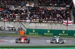 Valtteri Bottas (FIN) Mercedes AMG F1 W10 and Charles Leclerc (MON) Ferrari SF90 battle for position. 14.04.2019. Formula 1 World Championship, Rd 3, Chinese Grand Prix, Shanghai, China, Race Day.