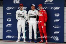 Qualifying top three in parc ferme (L to R): Lewis Hamilton (GBR) Mercedes AMG F1, second; Valtteri Bottas (FIN) Mercedes AMG F1, pole position; Sebastian Vettel (GER) Ferrari, third. 13.04.2019. Formula 1 World Championship, Rd 3, Chinese Grand Prix, Shanghai, China, Qualifying Day.